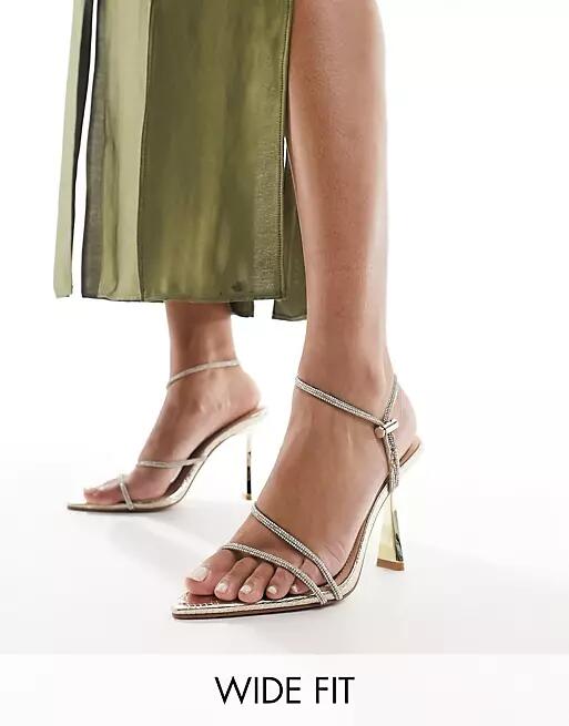 Simmi London Wide Fit Adia embellished heeled sandals in gold Cover