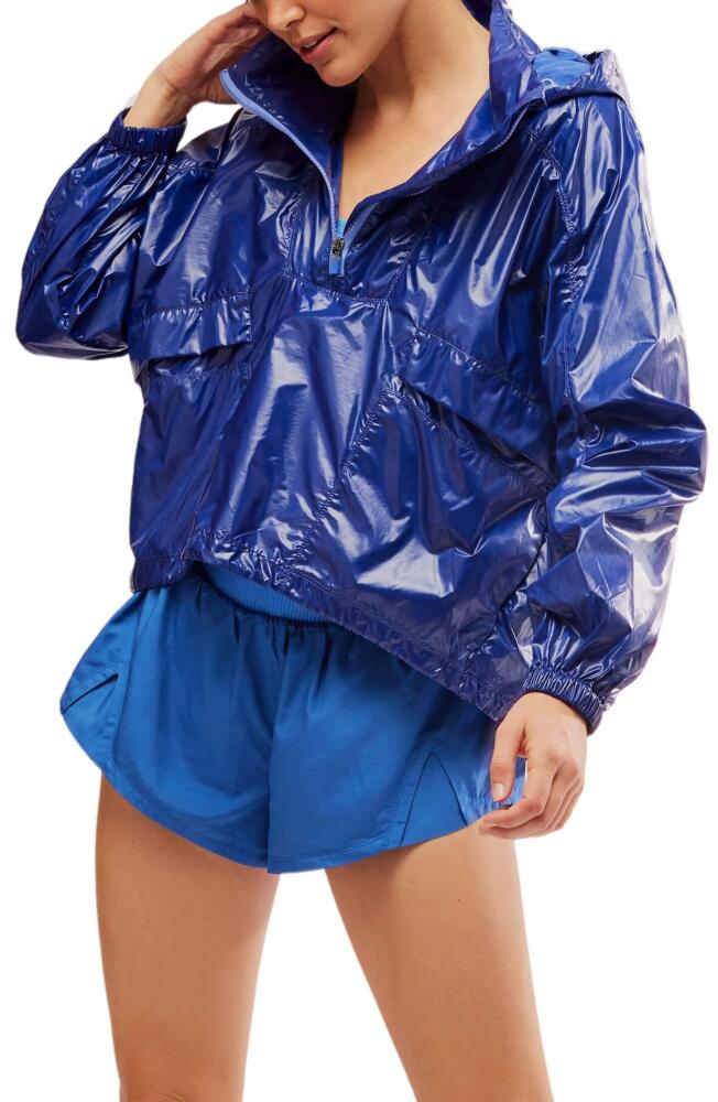 FP Movement by Free People Spring Showers Water Resistant Packable Rain Jacket in Atlantic Cover