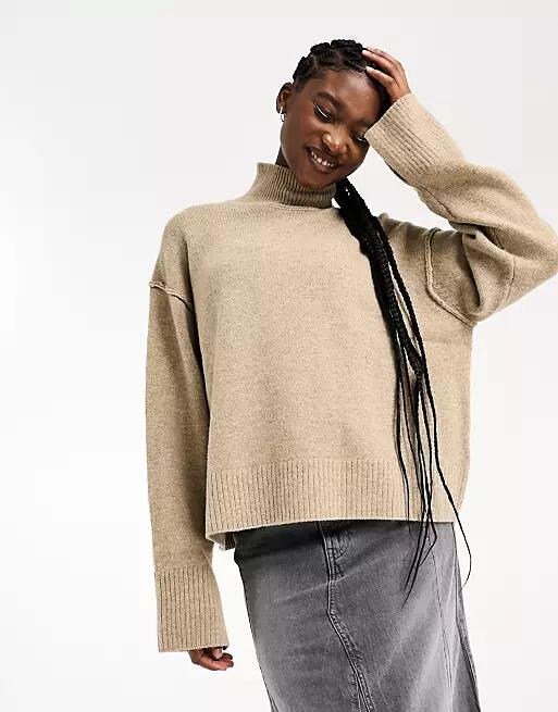 Weekday Maggie wool turtle neck sweater with exposed seam detail and wider sleeves in beige melange-Neutral Cover