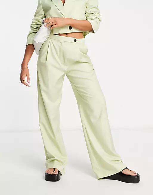 ASOS DESIGN slouchy wide leg suit pants in washed lime-Green Cover