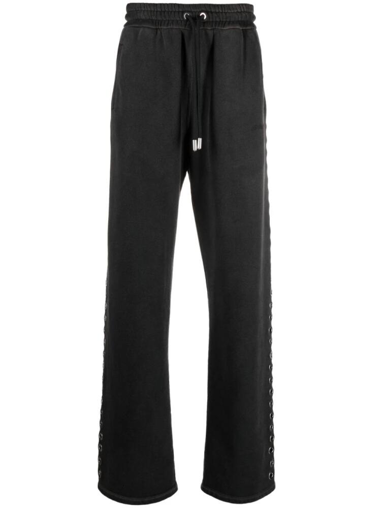 Off-White eyelet-embellished track pants - Black Cover