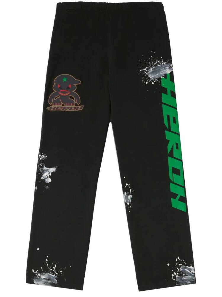 Heron Preston paint-splatter cotton track trousers - Black Cover