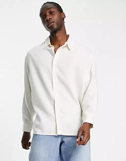 Weekday oversized long sleeve shirt in white Cover