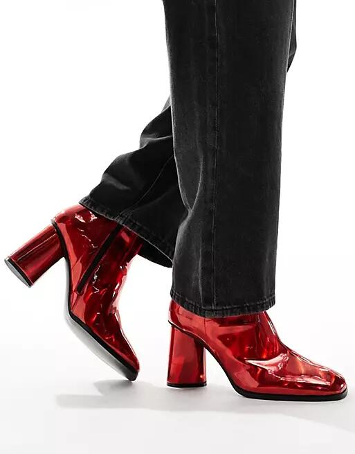 ASOS DESIGN heeled boots in red metallic Cover