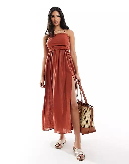 Urban Threads linen look halterneck midi dress in brown Cover