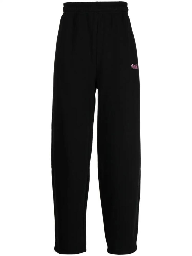 GmbH Ahmed logo-embroidered track pants - Black Cover