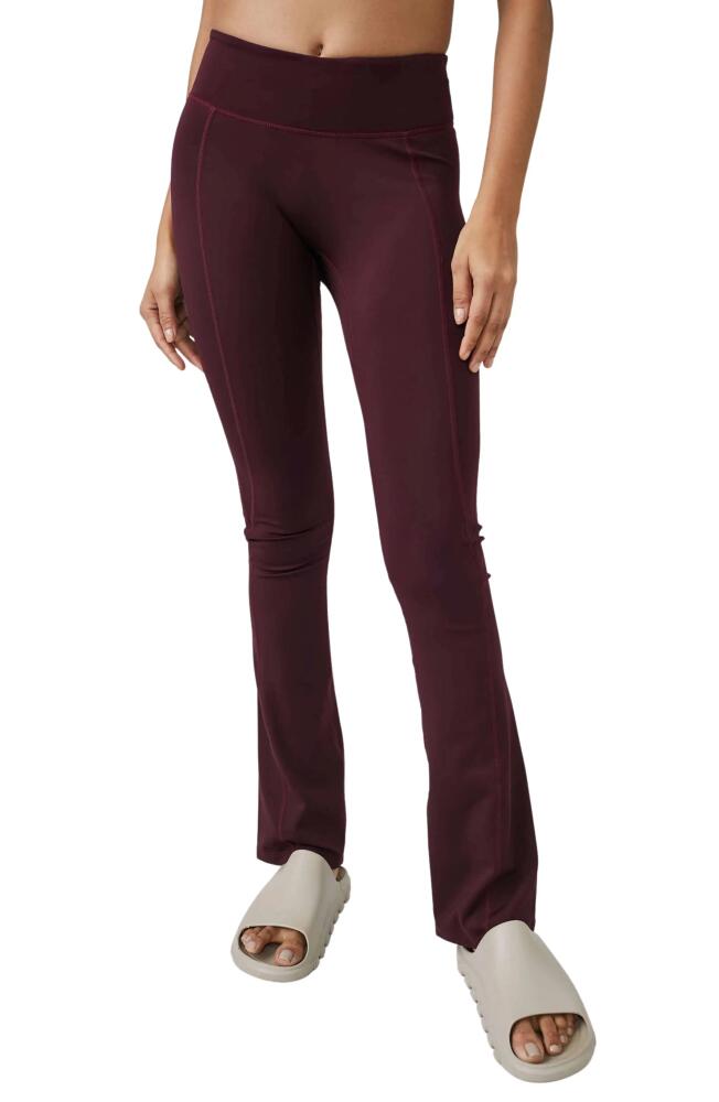 FP Movement by Free People Resilience Flare Leggings in Fig Jam Cover