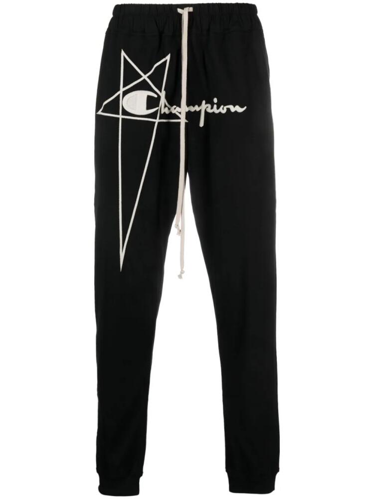 Rick Owens X Champion logo-embroidered cotton track pants - Black Cover