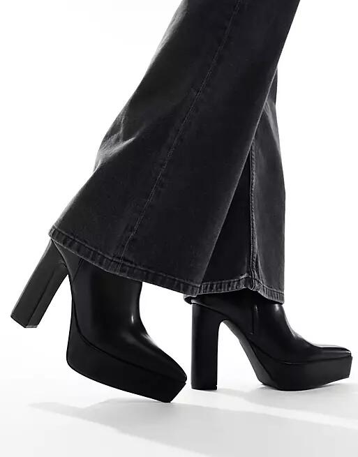 ASOS DESIGN platform heeled boots with pointed toe in black faux leather Cover