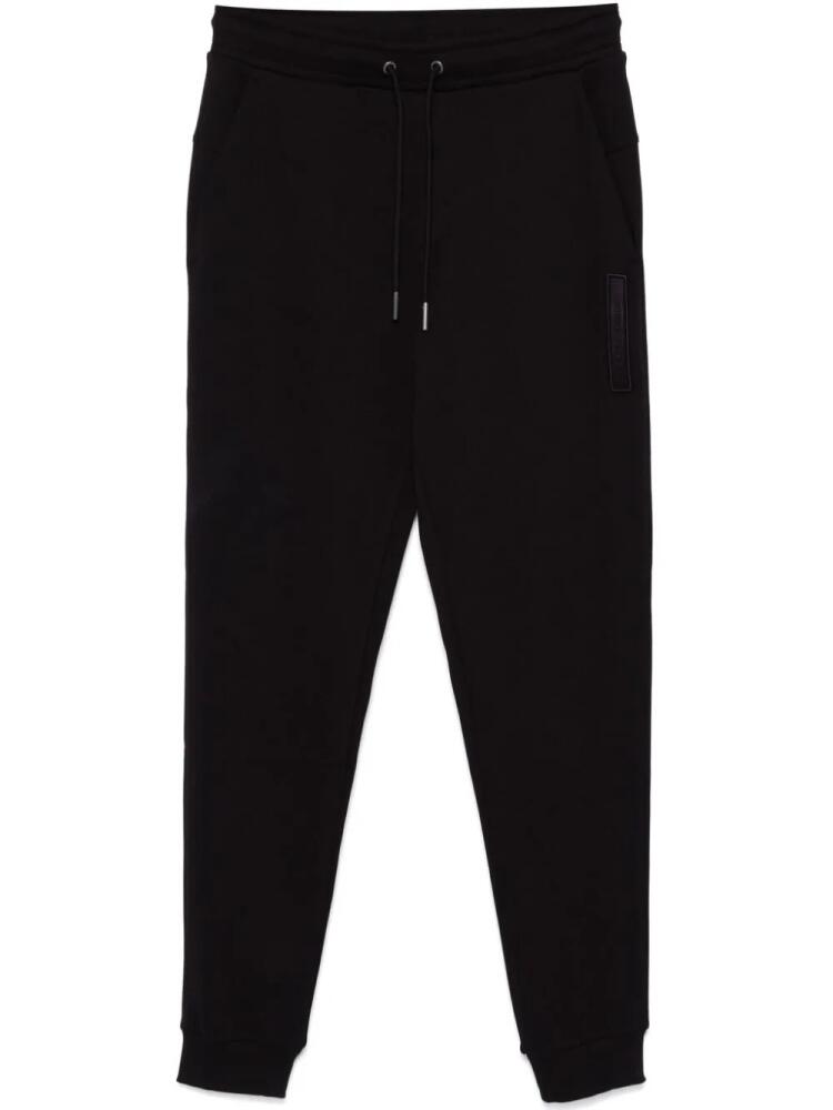 Calvin Klein logo-patch track pants - Black Cover