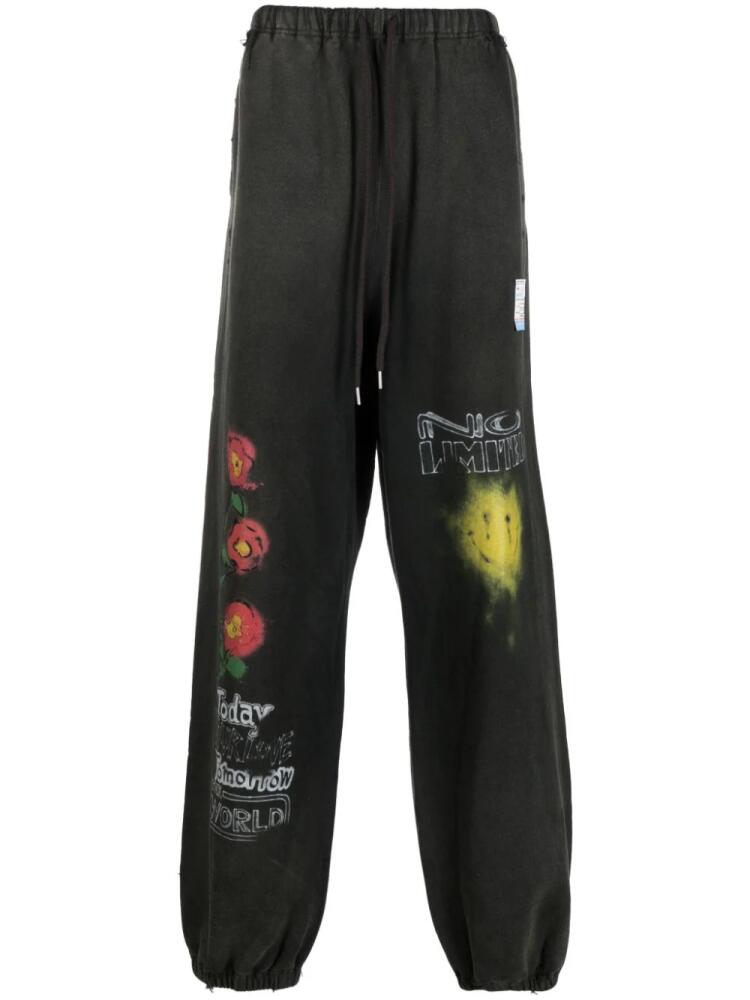 Maison MIHARA YASUHIRO slogan-print cotton track pants - Black Cover