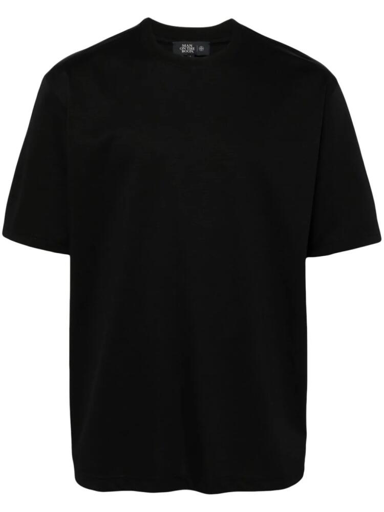 Man On The Boon. Glossy crew-neck cotton T-shirt - Black Cover