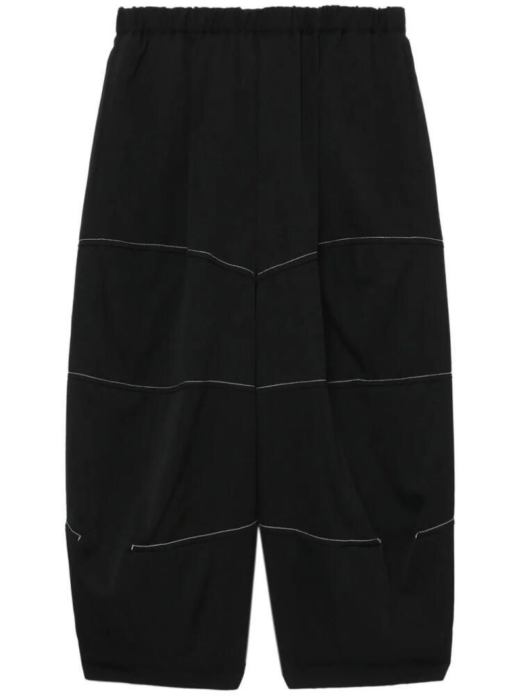 Black Comme Des Garçons tapered-leg cropped trousers Cover