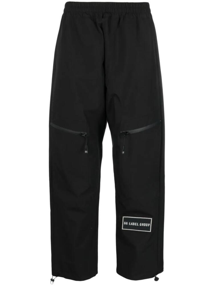 44 LABEL GROUP logo-patch straight-leg trousers - Black Cover