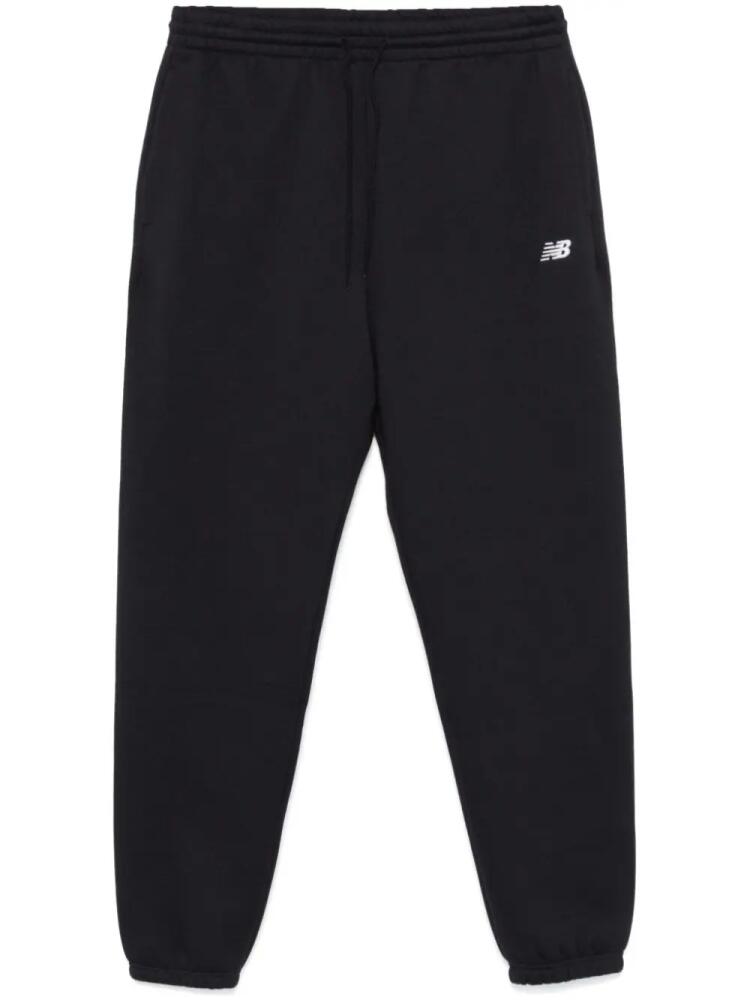 New Balance logo-embroidered track pants - Black Cover