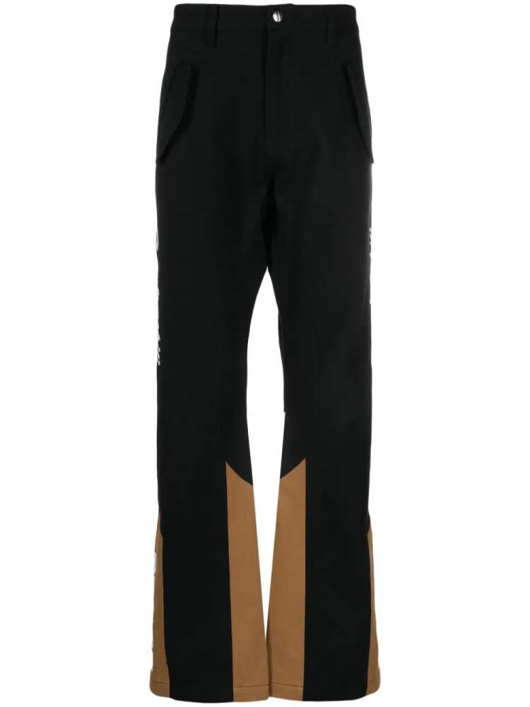 RHUDE logo-embroidered panelled trousers - Black Cover