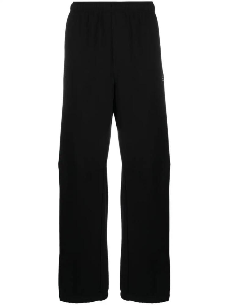 MM6 Maison Margiela numbers-embroidered cotton track pants - Black Cover