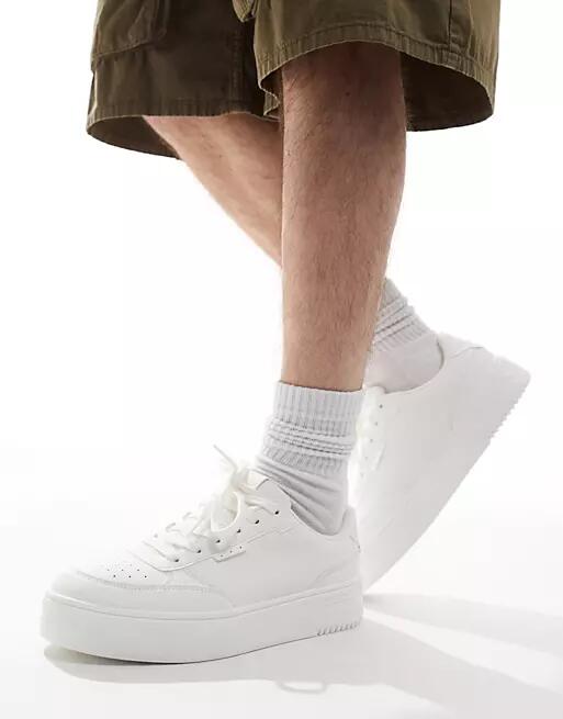 Pull & Bear chunky ridged sole sneakers in white Cover