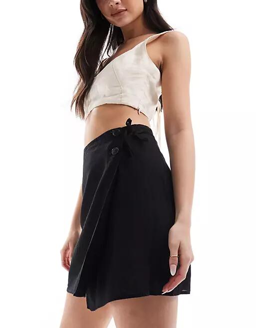 Monki linen mix wrap tie detail mini skirt in black Cover