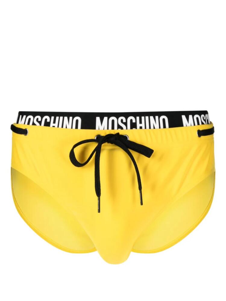 Moschino logo-waistband drawstring swim trunks - Yellow Cover