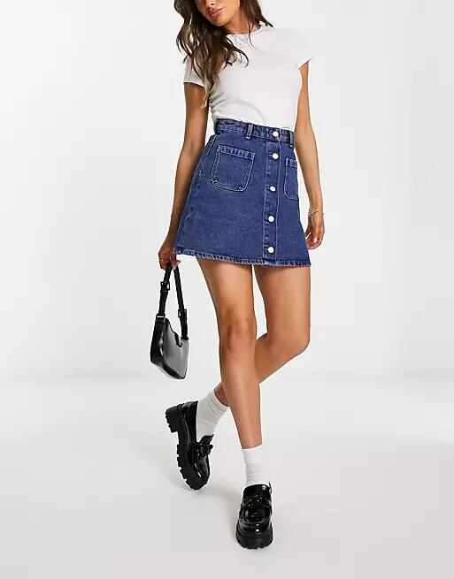 Monki denim button through mini skirt in mid-blue wash Cover