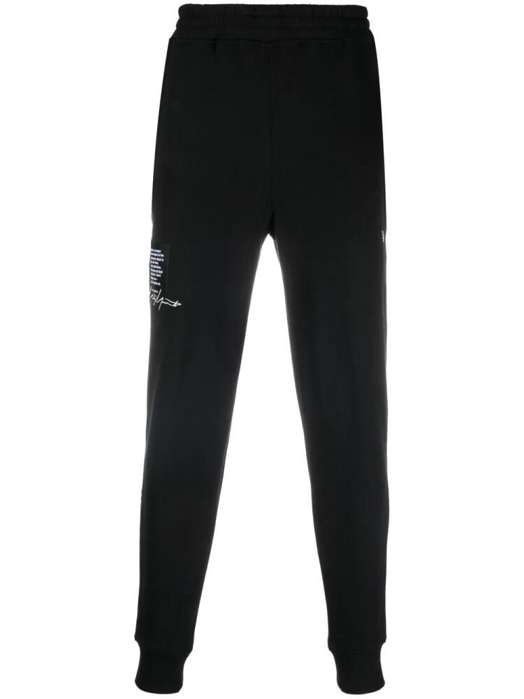 Yohji Yamamoto tapered-leg track pants - Black Cover