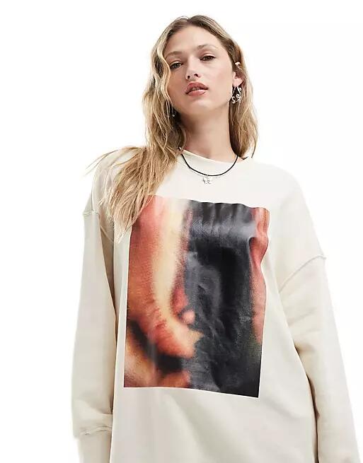 Monki long sleeve oversized sweater in beige with front print-Neutral Cover