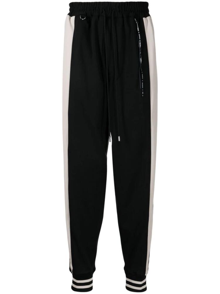 Mastermind World stripe-detail track pants - Black Cover