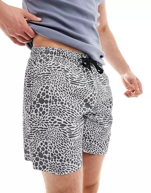 Pull & Bear monochrome printed swim shorts in black Cover