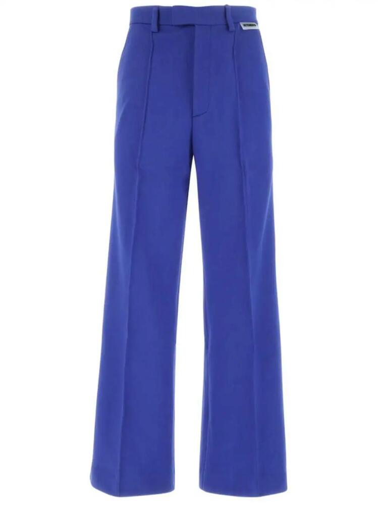 VETEMENTS logo-patch trousers - Blue Cover