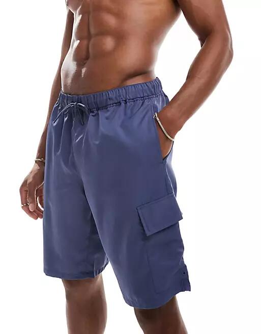 ASOS DESIGN swim shorts in long length with cargo pockets in navy Cover