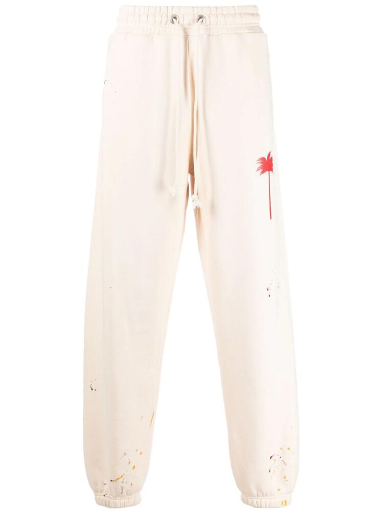 Palm Angels paint splatter-detail logo-print track pants - Neutrals Cover