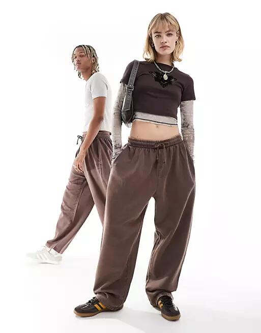 ASOS DESIGN unisex balloon sweatpants in washed brown Cover