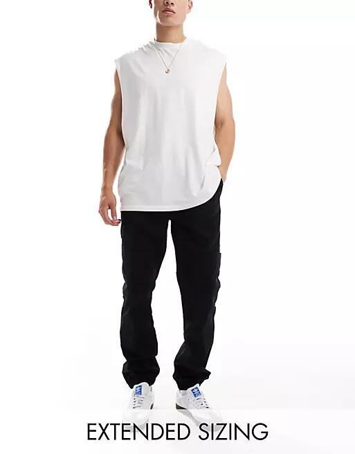 ASOS DESIGN pull on cargo sweatpants in black with elastic waist Cover