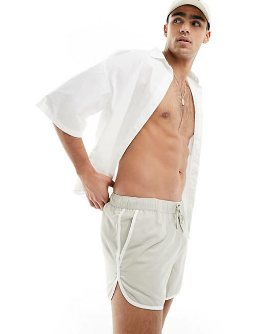 ASOS DESIGN runner swim shorts in short length in stone-Neutral Cover