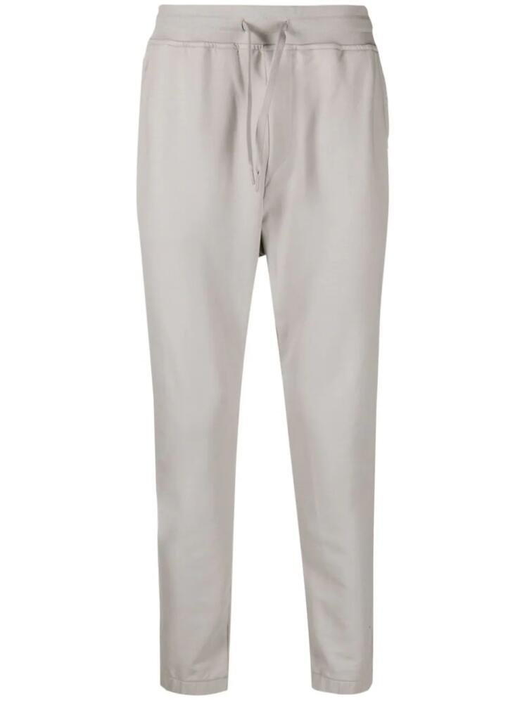 C.P. Company logo-print stretch-cotton track pants - Grey Cover