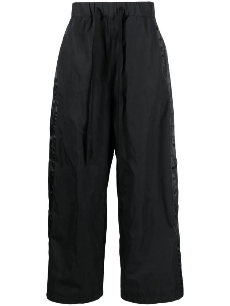 Junya Watanabe MAN drawstring wide-leg track pants - Black Cover