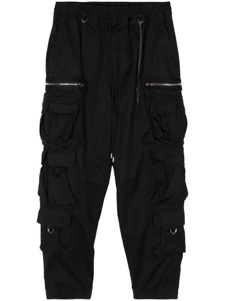 Mastermind World skull-print track pants - Black Cover