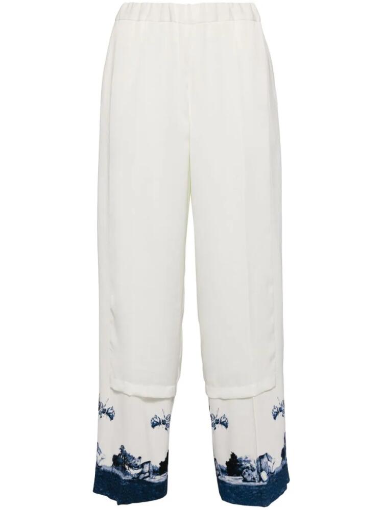 Undercover graphic-print panelled trousers - White Cover