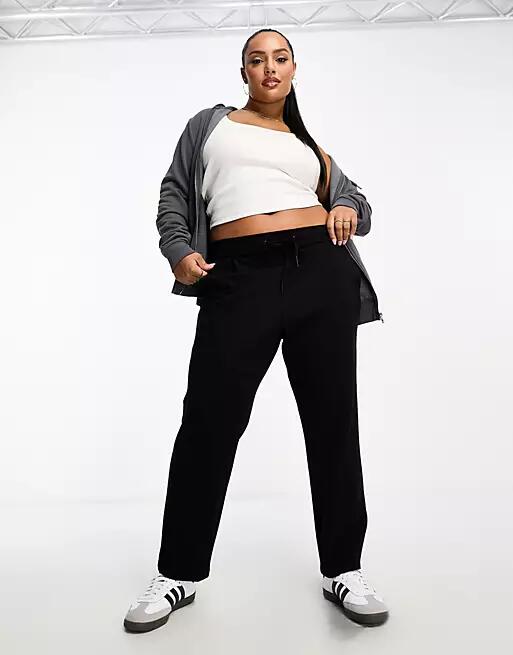 Vero Moda Curve tie waist tapered sweatpants in black Cover