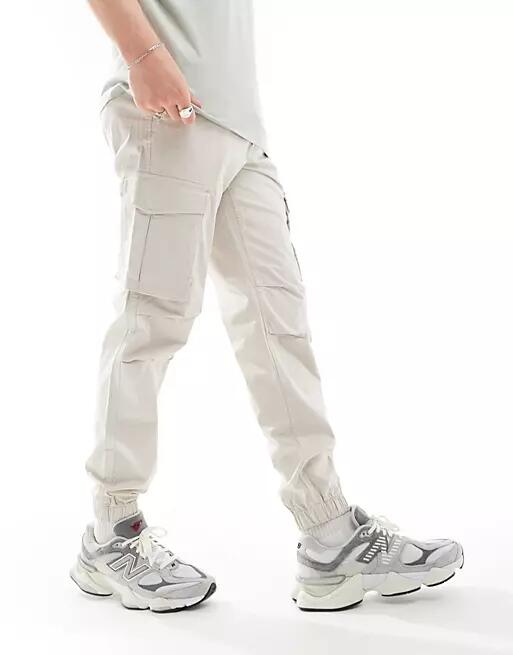 Jack & Jones relaxed fit cuffed cargo pants in beige-Neutral Cover