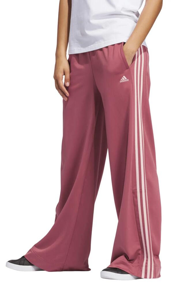 adidas Essentials Recycled Polyester Tricot Wide Leg Track Pants in Preloved Crimson/Sandy Pink Cover