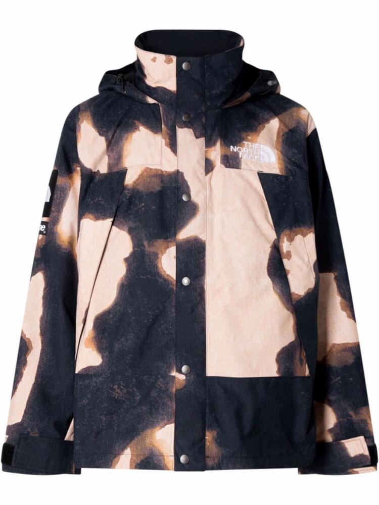 Supreme x The North Face bleached denim-print mountain jacket - Brown Cover