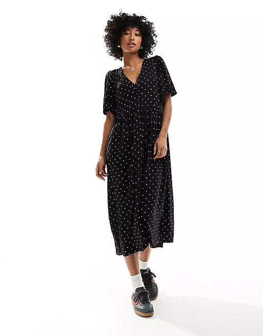 Monki short sleeve button up midi dress in black and white monochrome polka dot Cover