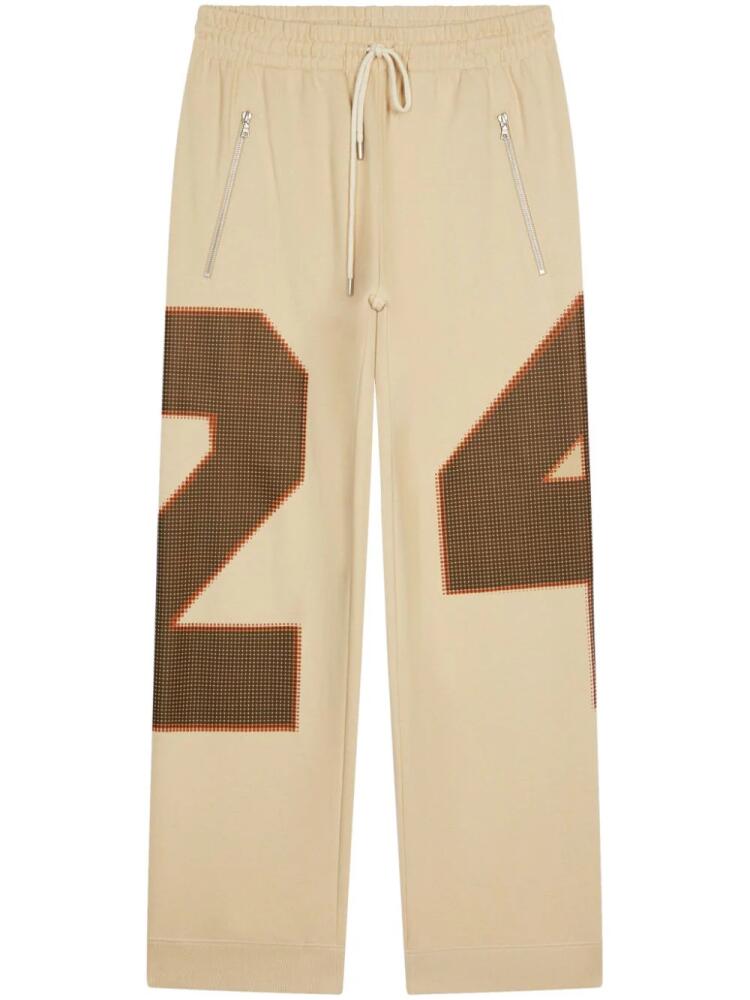 DRIES VAN NOTEN number-print cotton track pants - Neutrals Cover