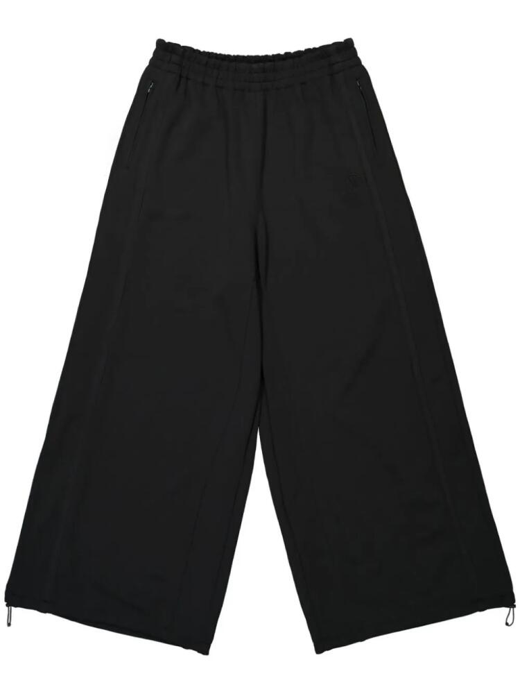 VETEMENTS wide-leg track pants - Black Cover