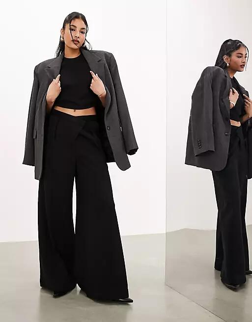 ASOS EDITION premium textured jersey wide leg pants with asymmetric waistband in black Cover