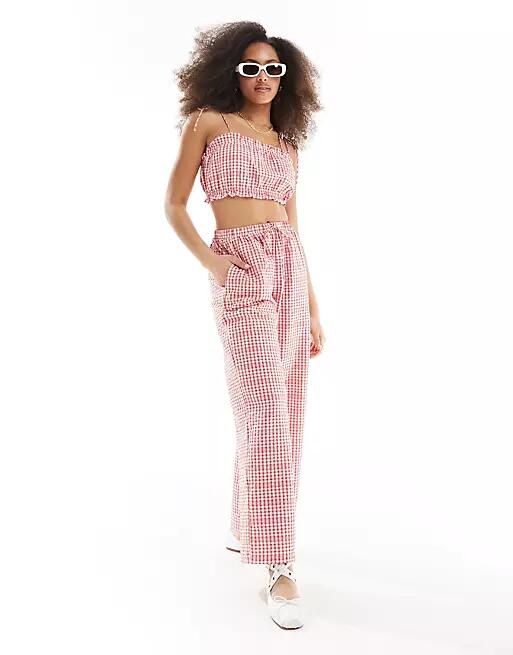 ASOS DESIGN gingham pull on pants in red Cover