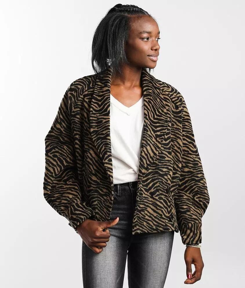 A. Peach Brushed Zebra Print Jacket Cover