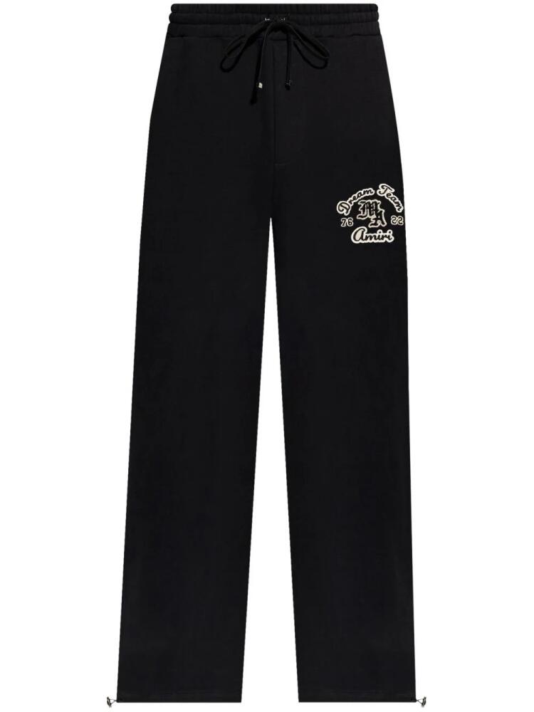 AMIRI logo-appliqué cotton track pants - Black Cover